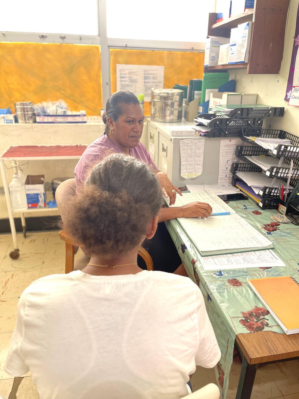 Valerie providing counselling to a teenager at Vila Central Hospital.