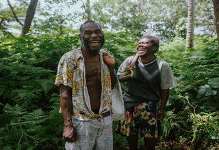 Lily Iawantak and her partner Kasi share a laugh at their village home on Tanna Island, Vanuatu. 
