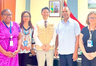 UNFPA Pacific Director Iori Kato offers humanitarian assistance to Hon. Minister of Climate Change Adaptation, Meteorology, Geo-