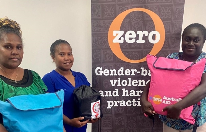 Participants of the UNFPA-supported MISP training in Honiara, the Solomon Islands, carrying Pacific-customized Dignity Kit, Wome