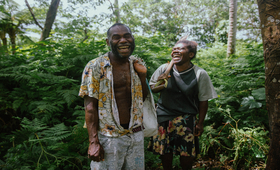 Lily Iawantak and her partner Kasi share a laugh at their village home on Tanna Island, Vanuatu. 