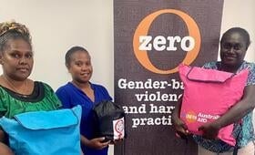 Participants of the UNFPA-supported MISP training in Honiara, the Solomon Islands, carrying Pacific-customized Dignity Kit, Wome