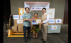 Mr. Iori Kato, UNFPA Director for the Pacific, together with Mr.  Kapchae Ra, Country Director of KOICA Fiji Office (left), hand