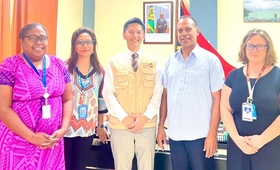 UNFPA Pacific Director Iori Kato offers humanitarian assistance to Hon. Minister of Climate Change Adaptation, Meteorology, Geo-