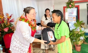 U.S. Ambassador Stands with Girls in Disaster-Stricken Tongan Community, Two Years On