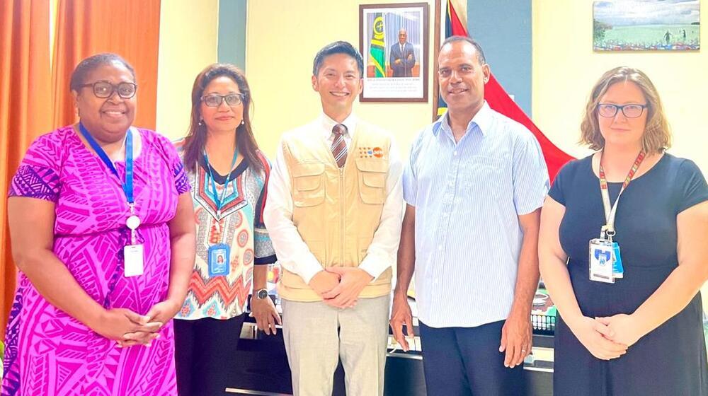 UNFPA Pacific Director Iori Kato offers humanitarian assistance to Hon. Minister of Climate Change Adaptation, Meteorology, Geo-