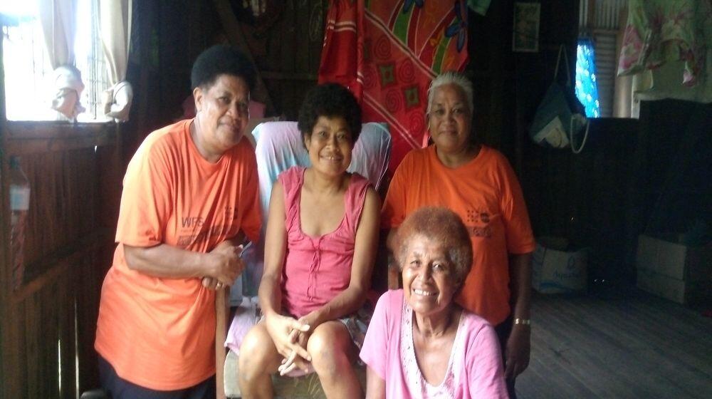 Mereia Wainisau Kotoitubuna, seated, with her mother Ana Sevu (in front) and the two retired midwives, Sr Mekita Vono and Sr Josefini Seeto.  Tukavesi, Vanua Levu. 